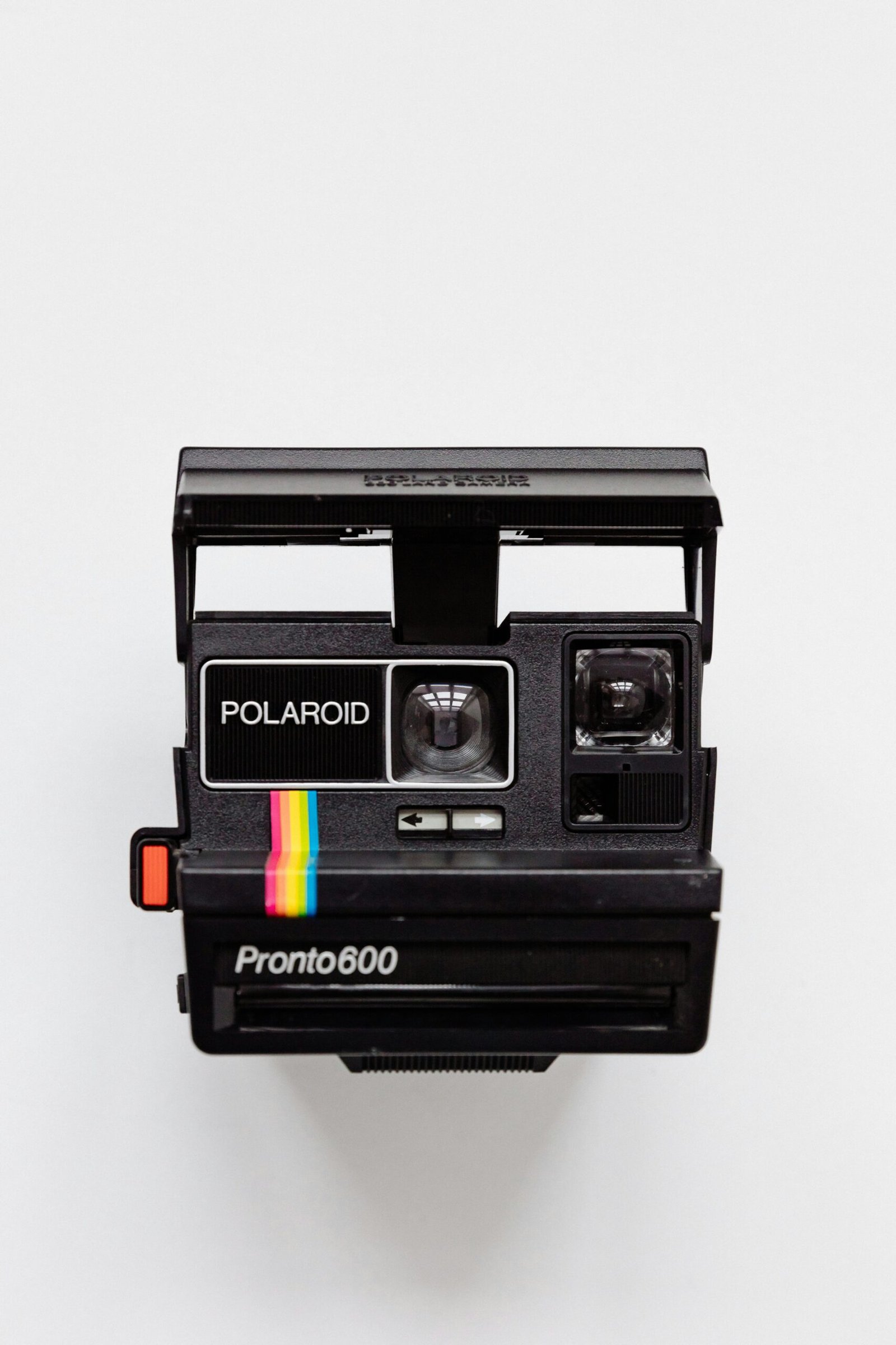 black Polaroid camera with white background